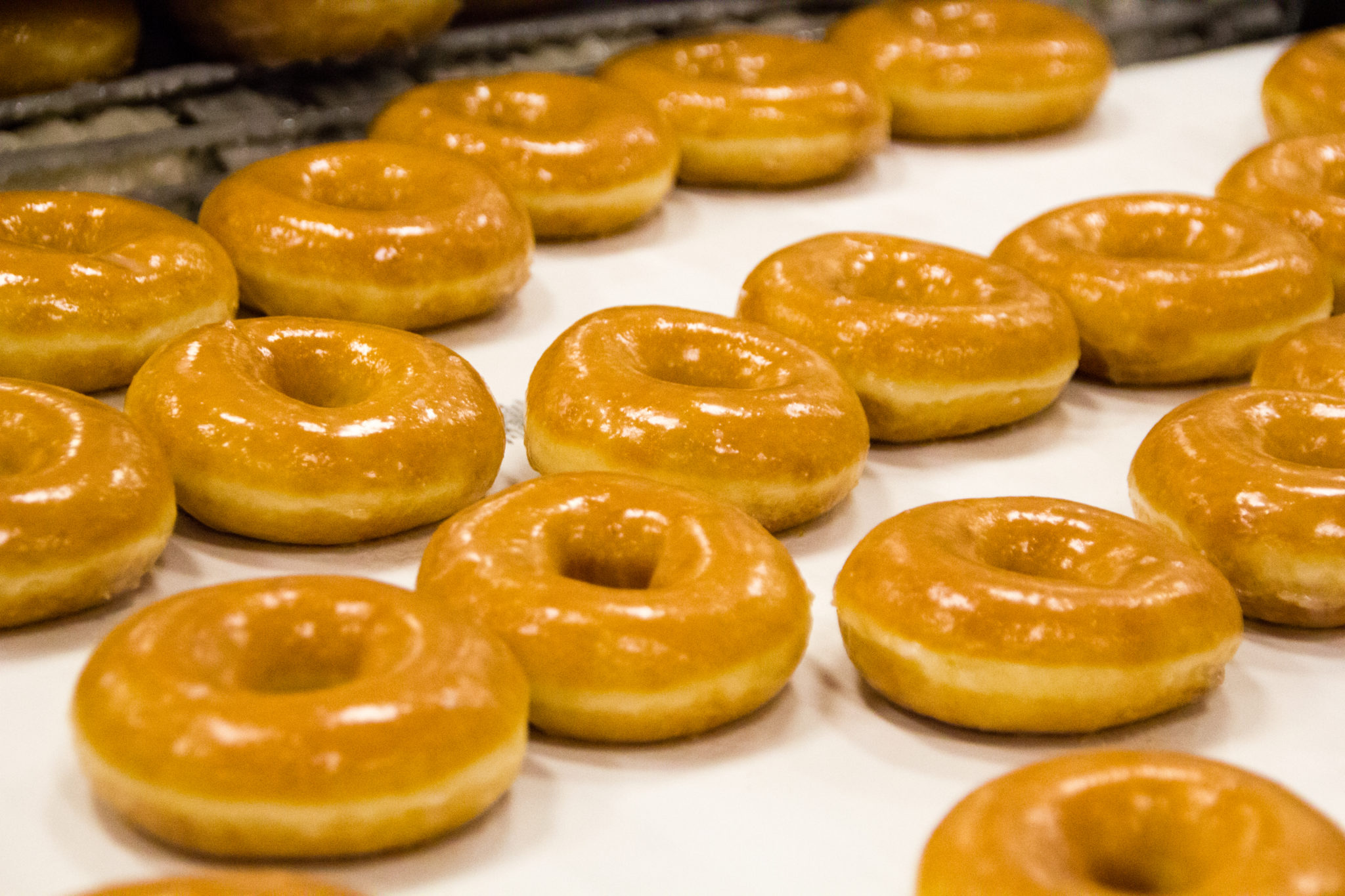 Detail,Of,A,Doughnut,Production,Business,With,Freshly,Baked,Donuts - 101.5 The Eagle